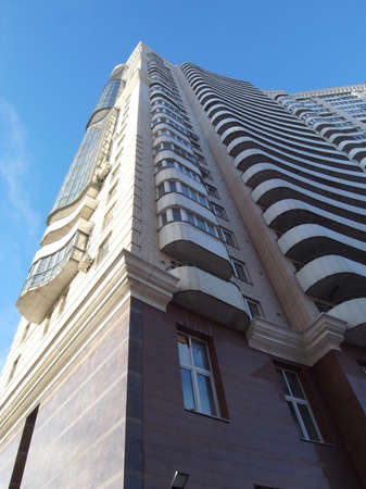 Wavy building. Modern house with interesting balconies. Bends balconies.の写真素材