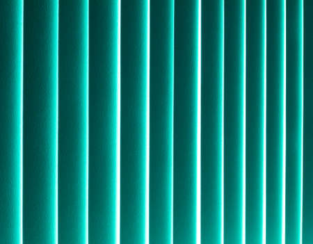 Vertical color lines. Texture, background, blinds. The green bamboo.の写真素材