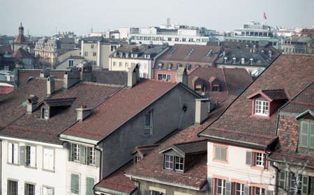 Rooftops of the city. Red tiled roofs, top view.の写真素材