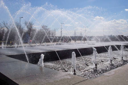 Fountain in the park. Sunny day in the park, fountain.の写真素材