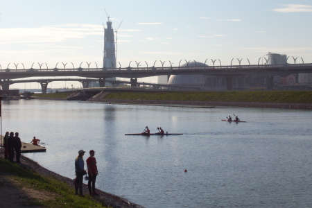 Competition in kayaks. Evening in the park, on the river training kayakers.