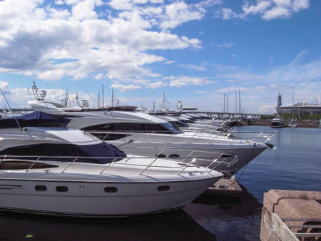 Yachts are on the pier. A clear day, everything is ready for sea walks.の写真素材