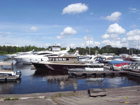 Yachts are on the pier. A clear day, everything is ready for sea walks.の写真素材