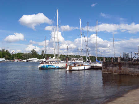 Yachts are on the pier. A clear day, everything is ready for sea walks.の写真素材