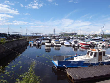 Yachts are on the pier. A clear day, everything is ready for sea walks.のeditorial素材