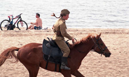 A dashing rider. Devvuska rides on a horse form the Red Army.のeditorial素材