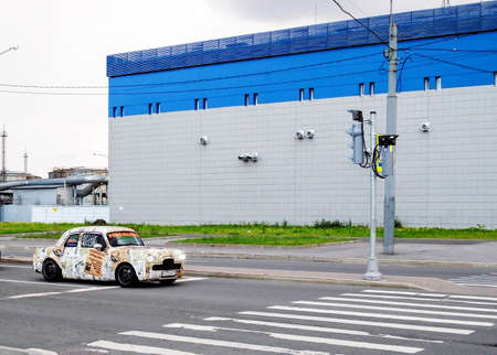 Newspaper-mobile, old car after tuning.のeditorial素材