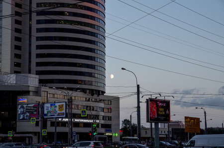 The moon is in the wires. Evening sky and moon.のeditorial素材