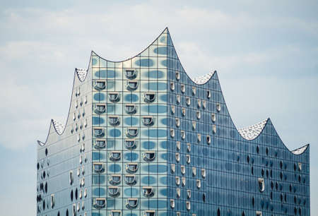 Close up view of the Hamburg Philharmonic above the Elbe river, sunny day.のeditorial素材
