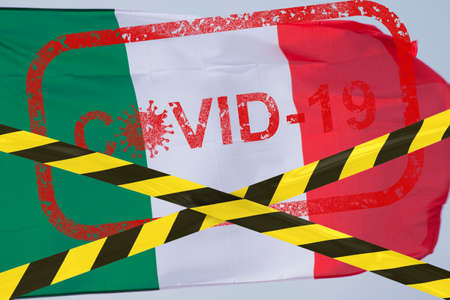Barrier tape - quarantine, isolation, travel ban, coronavirus pandemic. Italy flag waving in the...