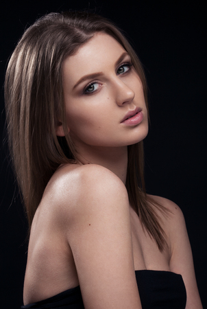 Beautiful woman on black bacground,Fashion portrait.Headshot.Classic portraitの写真素材