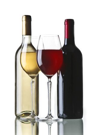 Bottle of red  and white wine with two glasses on white background. Perfect for bar and restaurantの写真素材