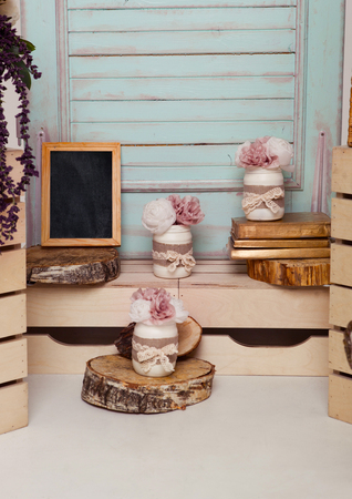 Interior decoration setup with flowers and picture frame.Pink doors,flowers.Great for wedding interiorの写真素材