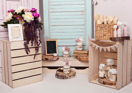 Interior decoration setup with flowers and picture frame.Pink doors,flowers.Great for wedding interiorの写真素材