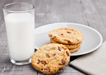 Glass og milk with coockies for breakfast morning in cafeの写真素材