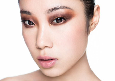 Beauty asian woman healthy cosmetic makeup portrait on white backgroundの写真素材