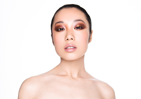 Beauty asian woman healthy cosmetic makeup portrait on white backgroundの写真素材