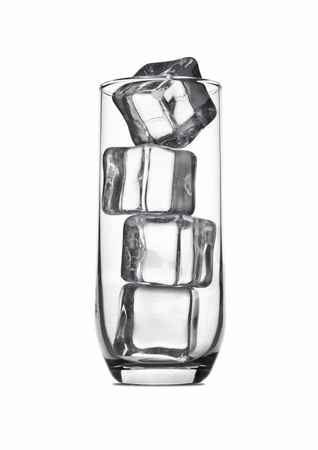 Empty juice soda glass with ice cubes reflection isolated on white backgroundの写真素材