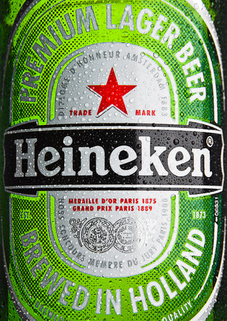 LONDON,UK -OCTOBER 23, 2016: Bottle of Heineken Lager Beer macro with frost drops. Heineken is the flagship product of Heineken Internationalのeditorial素材