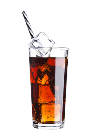 Glass of cola soda drink cold with ice cubes and straw on white backgroundの写真素材