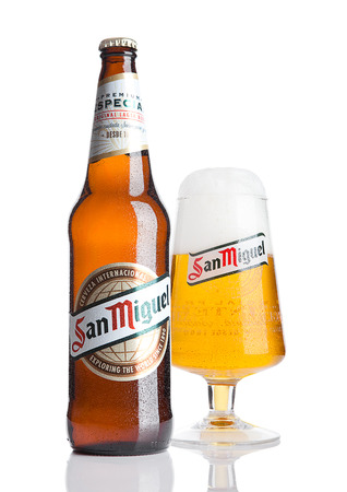 LONDON, UK- NOVEMBER, 2016: Cold bottle and glass of San Miguel beer. The San Miguel brand of beer is the leading brand of the San Miguel Brewery Inc, the largest beer producer in the Philippines.のeditorial素材