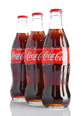 LONDON, UK - NOVEMBER 07, 2016: Classic bottles Of Coca-Cola on white background with frostのeditorial素材