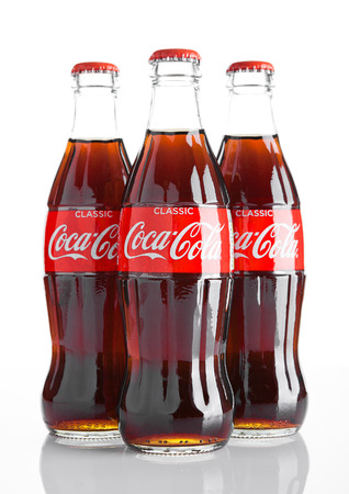 LONDON, UK - NOVEMBER 07, 2016: Classic bottles Of Coca-Cola on white background with frostのeditorial素材