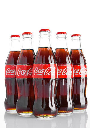 LONDON, UK - NOVEMBER 07, 2016: Classic bottles Of Coca-Cola on white background with frostのeditorial素材