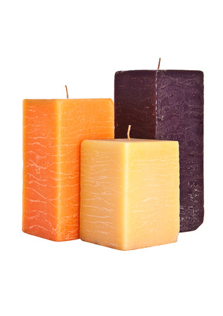 Set of three square candles isolated on white backgroundの写真素材