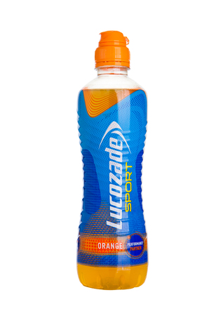 LONDON, UK - NOVEMBER 11, 2016: Cold bottle of Lucozade Sport energy drink with orange flavour on white background isolatedのeditorial素材