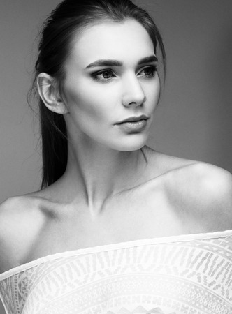 Portrait of beautiful woman girl white t-shirt black and whiteの写真素材