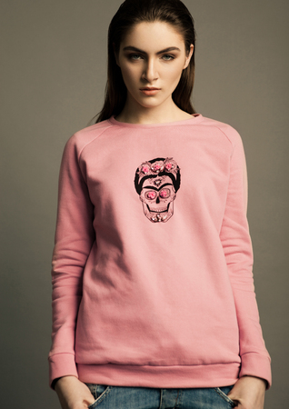 Beautiful fashion model wearing pink jumper skull in studioの写真素材