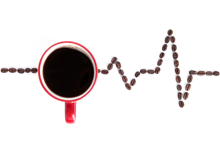 Red cup of coffee with heartbeat beans on white backgroundの写真素材