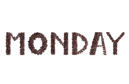Monday text made from fresh brown coffee beans on white background for cafeの写真素材