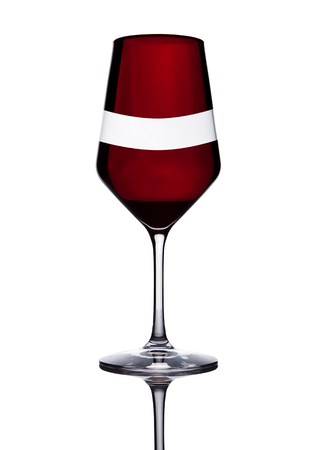 Glass of red wine with reflection on white backgroundの写真素材