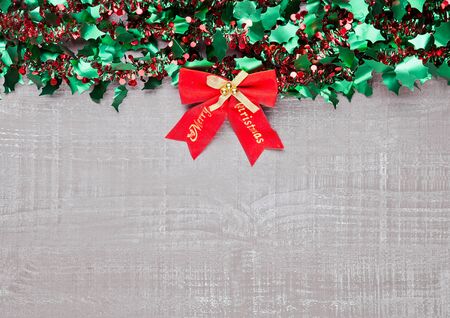 Christmas decoration yellow and green on wooden background.Toys.Stars.Ballsの写真素材