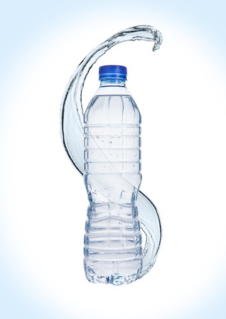 Bottle of still healthy water with splashes on white backgroundの写真素材