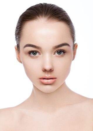 Beautiful woman girl natural makeup spa skin care portrait on white backgroundの写真素材