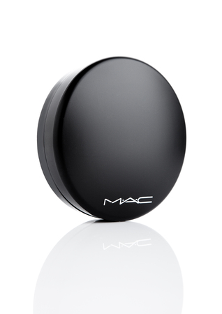 LONDON, UK - MARCH 15, 2017:  MAC Cosmetics skin powder foundation container on white background. MAC Cosmetics was founded in Toronto, Ontario, Canada in 1984.のeditorial素材