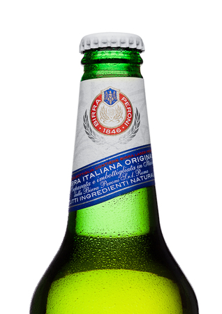 LONDON, UK - MARCH 15, 2017: Cold bottle of Peroni Beer with reflection. Founded n the town of Vigevano, Italy in 1846.のeditorial素材