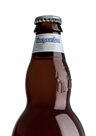 LONDON, UK - MAY 29, 2017: Bottle of Hoegaarden wheat Belgian beer on white background. Belgium and the producer of a well-known wheat beer.のeditorial素材