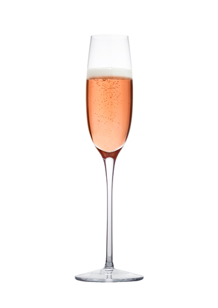 Rose pink champagne glass with bubbles isolated on white backgroundの写真素材
