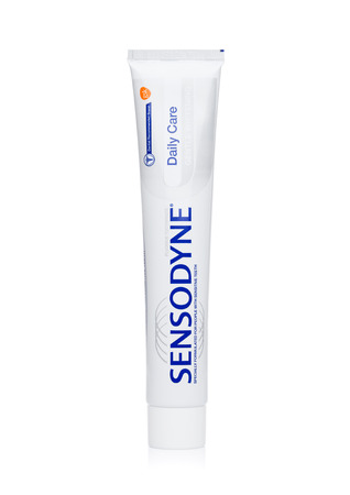LONDON, UK - NOVEMBER 10, 2017: Sensodyne dayly care toothpaste on white background,Sensodyne is a product by GlaxoSmithKlineのeditorial素材