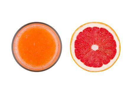 Fresh organic grapefruit juice glass top view  on white backgroundの写真素材