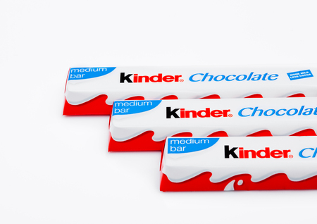LONDON, UK - November 17, 2017: Kinder chocolate bars on white background.Kinder bars are produced by Ferrero founded in 1946.のeditorial素材