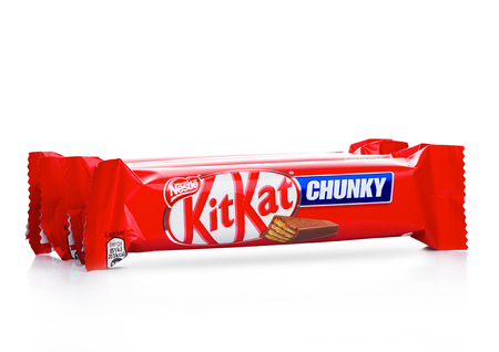 LONDON, UK -DECEMBER 07, 2017: Kit Kat chunky chocolate bar on white background. Bars Kit Kat is...