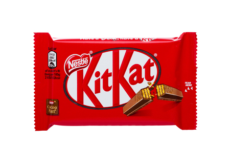 LONDON, UK -DECEMBER 07, 2017: Kit Kat chocolate bar on white background. Bars Kit Kat is produced...