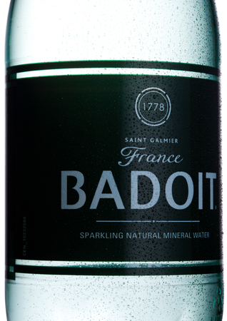 LONDON, UK - JANUARY 02, 2018: Plastic of Badoit Saint Galmier France mineral carbonated water on white background. Product by Danoneのeditorial素材