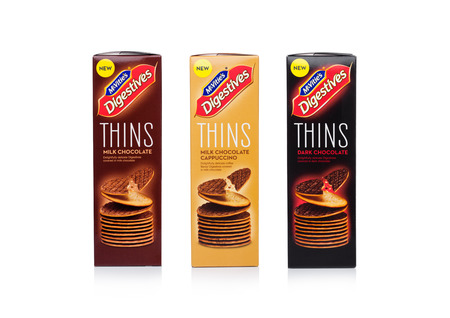 LONDON, UK - JANUARY 20, 2018: Boxes of McVities Digestives thins with  chocolate on white backgroundのeditorial素材