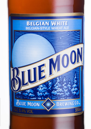 LONDON, UK - JUNE 01, 2018: Bottle label of Blue Moon belgian white beer, brewed by MillerCoors on white background.のeditorial素材